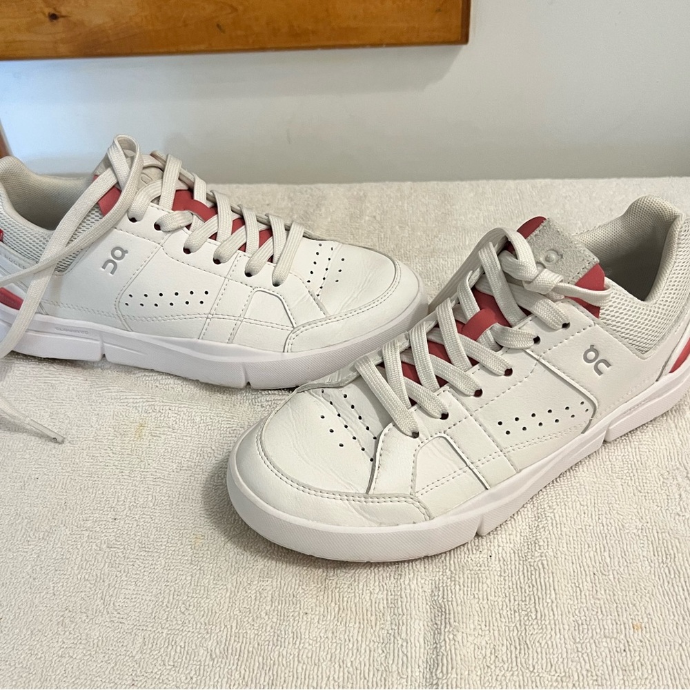 On Running White and Pink Sneakers